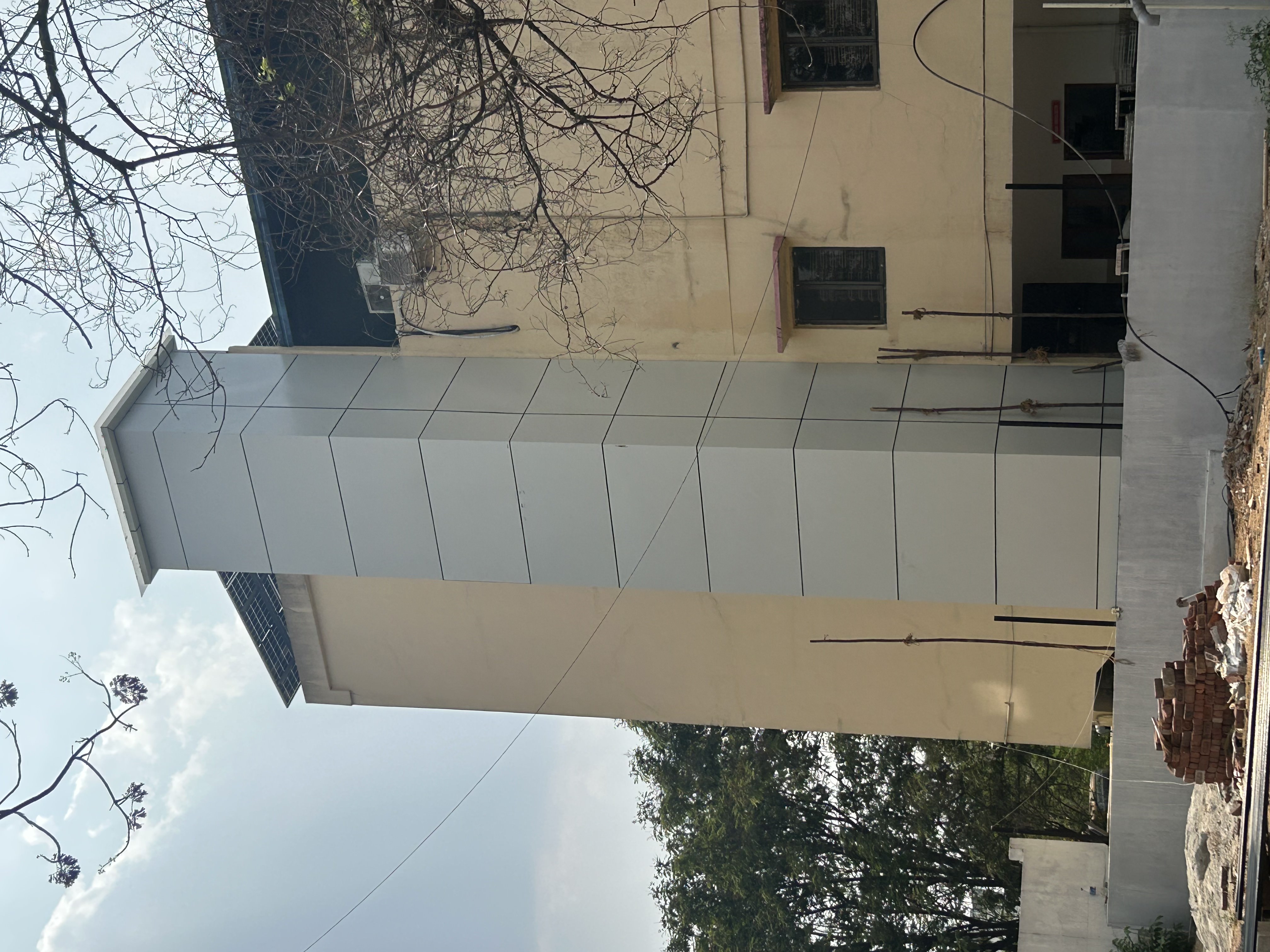iron structure with acp sheet covering 1 ton capacity goods lift